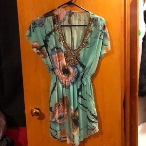 Floral patterned sheer tunic
